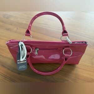 Pink Patent Leather Wine Clutch by Primeware, includes bottle opener. Never used